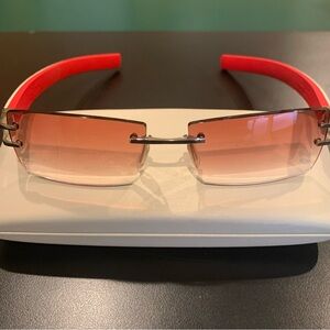 TAG Heuer 26289 L-Type Col 017 
White Alligator/Red & Silver 
Rimless Glasses